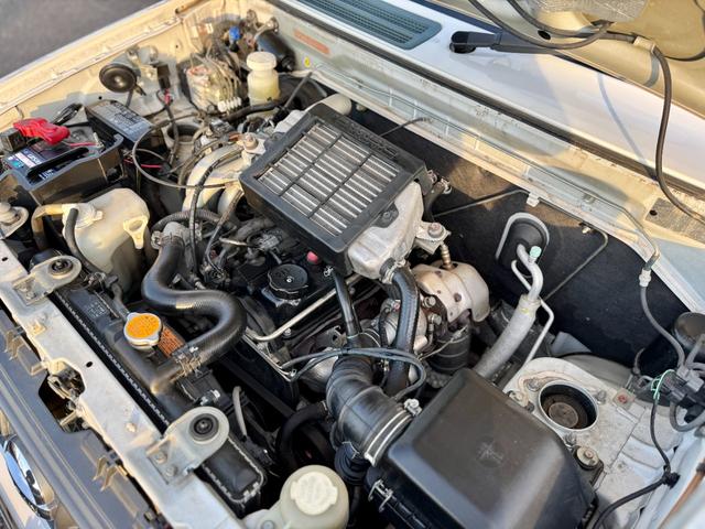 キックス RX 全国対応1年保証付 4速A/T・ターボ 4WD リフトアップ 社外15AW 社外ラテラルロッド パイプガード LED作業灯 フォグランプ ドアバイザー ディスプレイオーディオ キーレス 電動格納ミラー(56枚目)