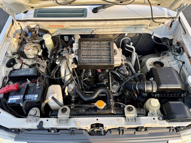 キックス RX 全国対応1年保証付 4速A/T・ターボ 4WD リフトアップ 社外15AW 社外ラテラルロッド パイプガード LED作業灯 フォグランプ ドアバイザー ディスプレイオーディオ キーレス 電動格納ミラー(57枚目)