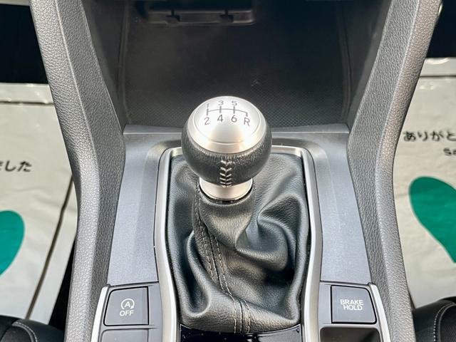 シビック ハッチバック　ホンダセンシング　後期型　６ＭＴ　革コンビシート（プライムスムースＸファブリック）　運転席８Ｗａｙ／助手席４Ｗａｙパワーシート　純正ナビ　ＴＶ　Ｂトゥース　バックカメラ　ＥＴＣ２．０　　シートヒーター　純正１８ＡＷ（4枚目）