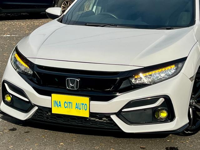 シビック ハッチバック　ホンダセンシング　後期型　６ＭＴ　革コンビシート（プライムスムースＸファブリック）　運転席８Ｗａｙ／助手席４Ｗａｙパワーシート　純正ナビ　ＴＶ　Ｂトゥース　バックカメラ　ＥＴＣ２．０　　シートヒーター　純正１８ＡＷ（14枚目）