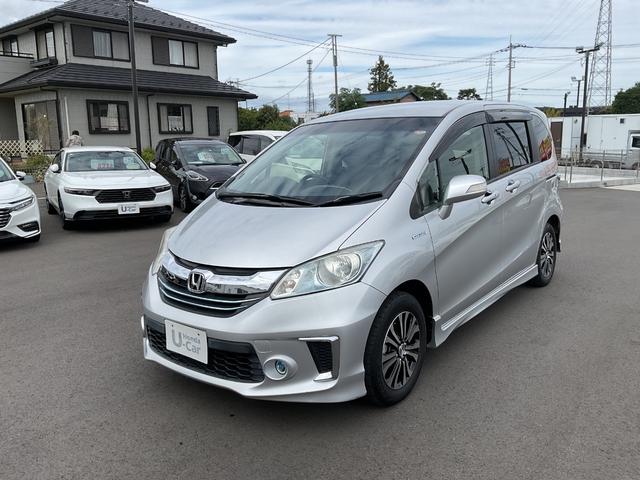 フリードハイブリッド ジャストセレクション ナビ ETC 両側電動スライドドア バックカメラ HIDヘッドライト フォグライト スマートキー 衝突安全ボディ クルコン オートエアコン エアバック キャプテンシート 純正アルミ ABS(2枚目)