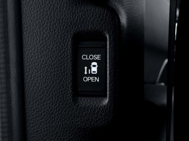 ステップワゴン ｅ：ＨＥＶスパーダ　／ＨＤＭＩ・純正ナビＴＶ／バックカメラ／ハーフレザーオットマン／シートヒーター／両電動ドア／電動リアゲート／ホンダセンシング／ルーフスポイラー／全列ＵＳＢ／１オナ／記録簿／禁煙車／新車保証継承（30枚目）