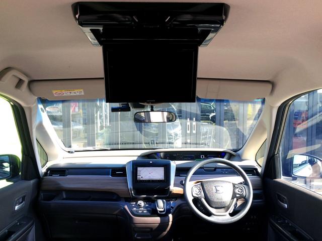 フリードハイブリッド ハイブリッド・Gホンダセンシング /4WD/HDMI・カロッツェリアSDナビTV/フリップダウンモニター/バックカメラ/シートヒーター/両電動ドア/ホンダセンシング/Fドラレコ/ETC/スマキー/1オナ/禁煙車/全国1年保証(2枚目)