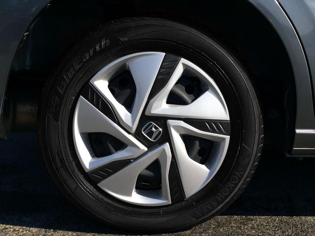 フリードハイブリッド ハイブリッド・Gホンダセンシング /4WD/HDMI・カロッツェリアSDナビTV/フリップダウンモニター/バックカメラ/シートヒーター/両電動ドア/ホンダセンシング/Fドラレコ/ETC/スマキー/1オナ/禁煙車/全国1年保証(11枚目)