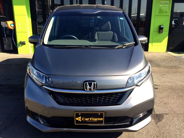 フリードハイブリッド ハイブリッド・Gホンダセンシング /4WD/HDMI・カロッツェリアSDナビTV/フリップダウンモニター/バックカメラ/シートヒーター/両電動ドア/ホンダセンシング/Fドラレコ/ETC/スマキー/1オナ/禁煙車/全国1年保証(12枚目)