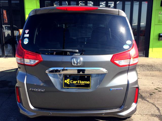 フリードハイブリッド ハイブリッド・Gホンダセンシング /4WD/HDMI・カロッツェリアSDナビTV/フリップダウンモニター/バックカメラ/シートヒーター/両電動ドア/ホンダセンシング/Fドラレコ/ETC/スマキー/1オナ/禁煙車/全国1年保証(13枚目)