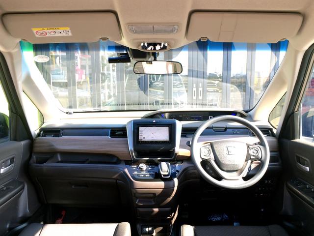 フリードハイブリッド ハイブリッド・Gホンダセンシング /4WD/HDMI・カロッツェリアSDナビTV/フリップダウンモニター/バックカメラ/シートヒーター/両電動ドア/ホンダセンシング/Fドラレコ/ETC/スマキー/1オナ/禁煙車/全国1年保証(16枚目)