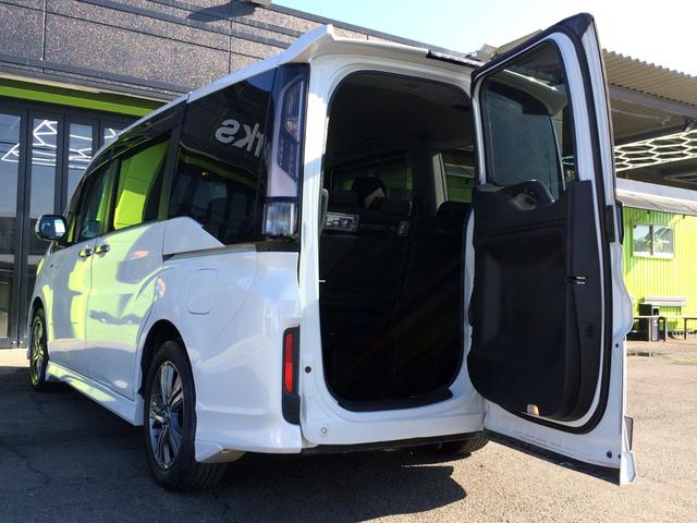 ステップワゴンスパーダ スパーダハイブリッド　Ｇ　ホンダセンシング　／ＨＤＭＩ・純正９インチナビＴＶ／純正フリップダウンモニター／バックカメラ／両電動ドア／ホンダセンシング／わくわくゲート／ＵＳＢポート／シートバックテーブル／禁煙車／全国１年保証（8枚目）