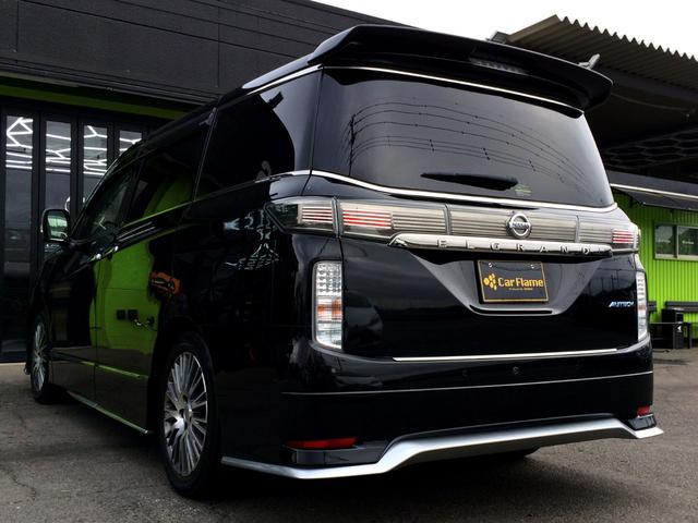 エルグランド オーテック　／４ＷＤ／Ｗサンルーフ／オーテックエアロ＆専用レザーシート／シートヒーター／純正１０インチナビ／純正フリップダウンモニター／全周囲カメラ／電動ゲート／両電動ドア／１オナ／記録簿／禁煙車／全国１年保証（8枚目）