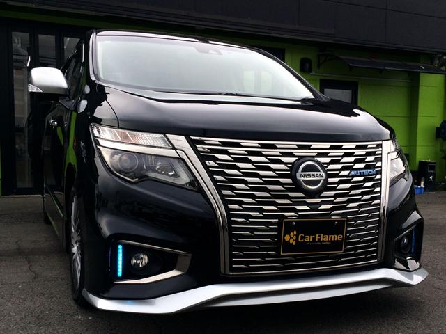 エルグランド オーテック　／４ＷＤ／Ｗサンルーフ／オーテックエアロ＆専用レザーシート／シートヒーター／純正１０インチナビ／純正フリップダウンモニター／全周囲カメラ／電動ゲート／両電動ドア／１オナ／記録簿／禁煙車／全国１年保証（10枚目）