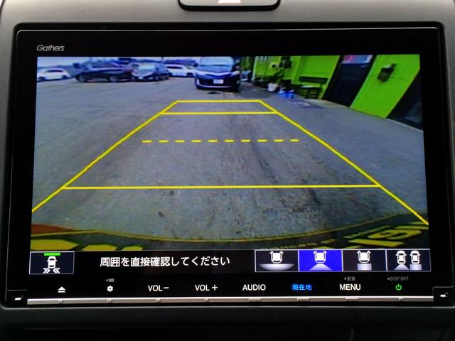 フリードハイブリッド ハイブリッド・クロスターホンダセンシング /クロスター専用装備/純正9インチナビ/フリップダウンモニター/バックカメラ/ハーフレザーシート/シートヒーター/両電動ドア/ホンダセンシング/純正ドラレコ/1オナ/記録簿/禁煙車/全国1年保証(4枚目)
