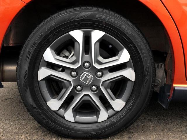 フリードハイブリッド ハイブリッド・クロスターホンダセンシング /クロスター専用装備/純正9インチナビ/フリップダウンモニター/バックカメラ/ハーフレザーシート/シートヒーター/両電動ドア/ホンダセンシング/純正ドラレコ/1オナ/記録簿/禁煙車/全国1年保証(11枚目)