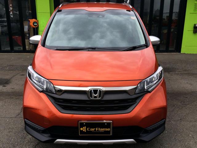 フリードハイブリッド ハイブリッド・クロスターホンダセンシング /クロスター専用装備/純正9インチナビ/フリップダウンモニター/バックカメラ/ハーフレザーシート/シートヒーター/両電動ドア/ホンダセンシング/純正ドラレコ/1オナ/記録簿/禁煙車/全国1年保証(12枚目)