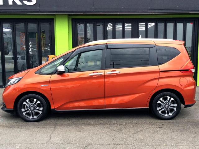 フリードハイブリッド ハイブリッド・クロスターホンダセンシング /クロスター専用装備/純正9インチナビ/フリップダウンモニター/バックカメラ/ハーフレザーシート/シートヒーター/両電動ドア/ホンダセンシング/純正ドラレコ/1オナ/記録簿/禁煙車/全国1年保証(15枚目)