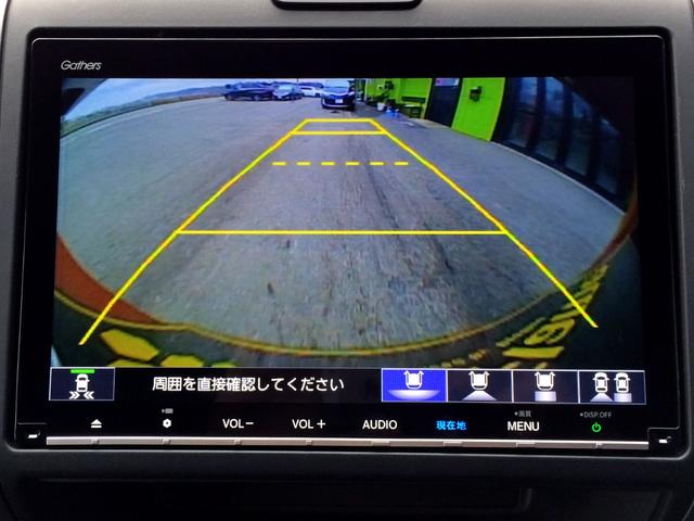 フリードハイブリッド ハイブリッド・クロスターホンダセンシング /クロスター専用装備/純正9インチナビ/フリップダウンモニター/バックカメラ/ハーフレザーシート/シートヒーター/両電動ドア/ホンダセンシング/純正ドラレコ/1オナ/記録簿/禁煙車/全国1年保証(22枚目)