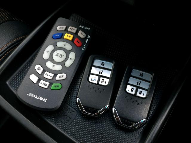 フリードハイブリッド ハイブリッド・クロスターホンダセンシング /クロスター専用装備/純正9インチナビ/フリップダウンモニター/バックカメラ/ハーフレザーシート/シートヒーター/両電動ドア/ホンダセンシング/純正ドラレコ/1オナ/記録簿/禁煙車/全国1年保証(27枚目)