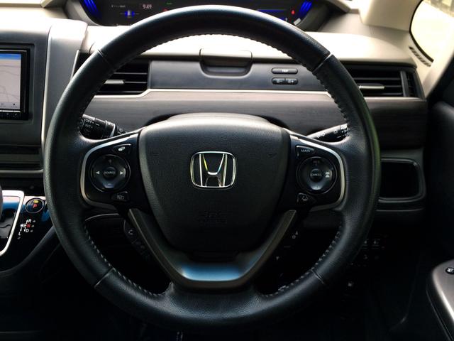 フリードハイブリッド ハイブリッド・Ｇホンダセンシング　／ＨＤＭＩ・カロッツェリアＳＤナビＴＶ／フリップダウンモニター／バックカメラ／純正ＦＲドラレコ／ハーフレザーシート／純正１５ＡＷ／両電動ドア／ホンダセンシング／東京１オナ／記録簿／禁煙車／全国１年保証（15枚目）