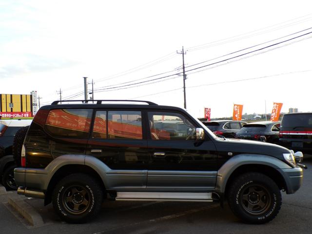 ランドクルーザープラド ＴＸリミテッド　丸目ヘッドライト　社外アルミ　ＳＡＸＯＮマフラー　サンルーフ　ＫＥＮＷＯＯＤナビ　地デジ　ＤＶＤ　後席用モニター（9枚目）