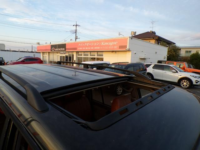 ランドクルーザープラド ＴＸリミテッド　丸目ヘッドライト　社外アルミ　ＳＡＸＯＮマフラー　サンルーフ　ＫＥＮＷＯＯＤナビ　地デジ　ＤＶＤ　後席用モニター（11枚目）