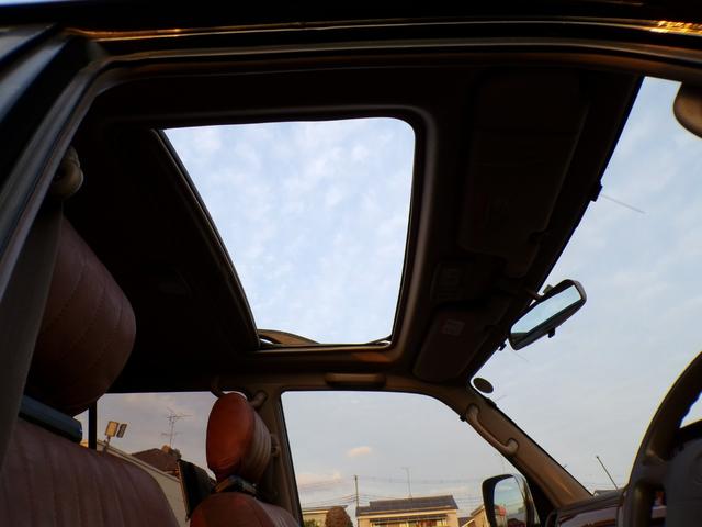 ランドクルーザープラド ＴＸリミテッド　丸目ヘッドライト　社外アルミ　ＳＡＸＯＮマフラー　サンルーフ　ＫＥＮＷＯＯＤナビ　地デジ　ＤＶＤ　後席用モニター（12枚目）