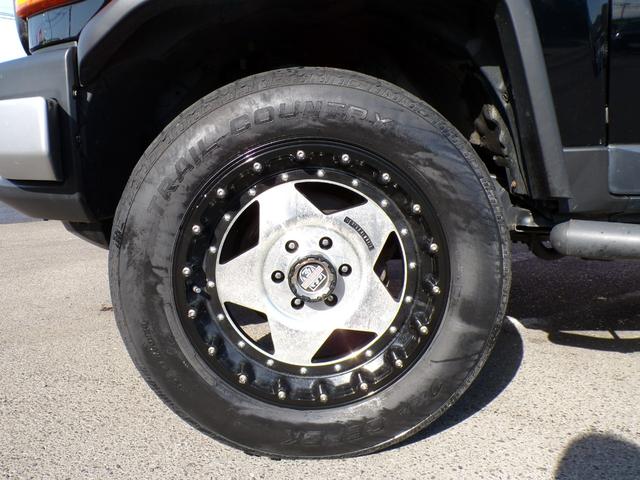 FJクルーザー カラーパッケージ リフトアップ 社外アルミ リアラダー ルーフラック ナビ 地デジ Bluetooth コーナーセンサー バックカメラ クルーズコントロール ETC ステアリングスイッチ キーレス サイドステップ4WD(70枚目)