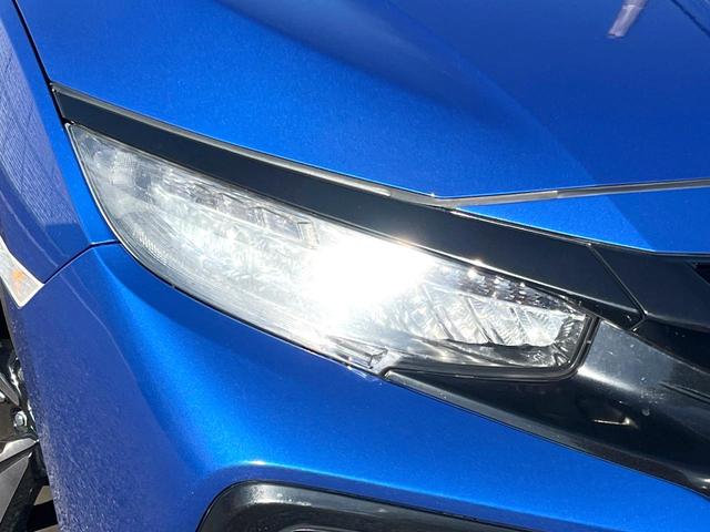 シビック ハッチバック　ホンダセンシング　６速ＭＴ　純正ナビ　ＥＴＣ　ドライブレコーダー　ＬＥＤヘッドライト　純正１８インチアルミホイール　シートヒーター　スマートキー　アイドリングストップ　オートライト　オートエアコン　革巻きステアリング（12枚目）