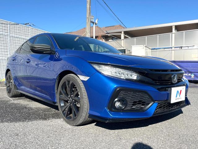 シビック ハッチバック　ホンダセンシング　６速ＭＴ　純正ナビ　ＥＴＣ　ドライブレコーダー　ＬＥＤヘッドライト　純正１８インチアルミホイール　シートヒーター　スマートキー　アイドリングストップ　オートライト　オートエアコン　革巻きステアリング（16枚目）