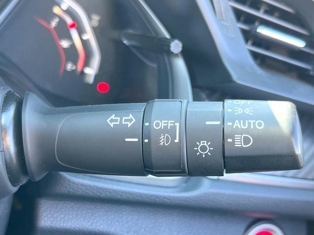 シビック ハッチバック　ホンダセンシング　６速ＭＴ　純正ナビ　ＥＴＣ　ドライブレコーダー　ＬＥＤヘッドライト　純正１８インチアルミホイール　シートヒーター　スマートキー　アイドリングストップ　オートライト　オートエアコン　革巻きステアリング（21枚目）