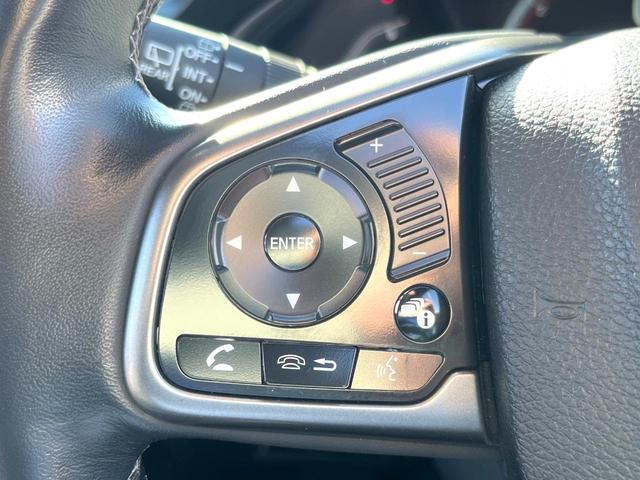 シビック ハッチバック　ホンダセンシング　６速ＭＴ　純正ナビ　ＥＴＣ　ドライブレコーダー　ＬＥＤヘッドライト　純正１８インチアルミホイール　シートヒーター　スマートキー　アイドリングストップ　オートライト　オートエアコン　革巻きステアリング（24枚目）