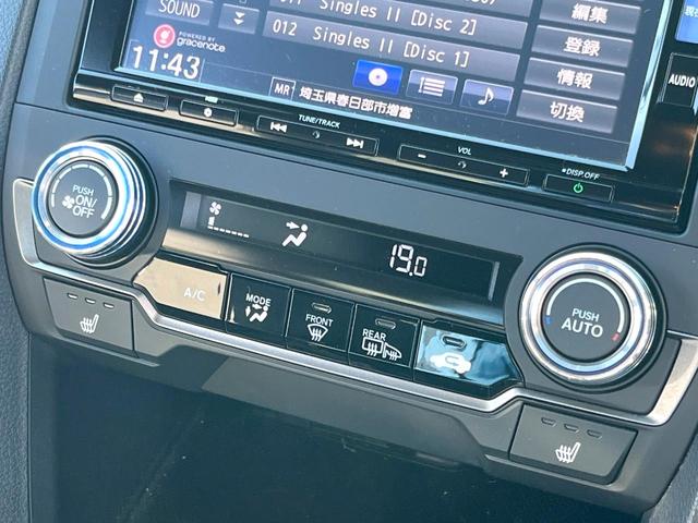 シビック ハッチバック　ホンダセンシング　６速ＭＴ　純正ナビ　ＥＴＣ　ドライブレコーダー　ＬＥＤヘッドライト　純正１８インチアルミホイール　シートヒーター　スマートキー　アイドリングストップ　オートライト　オートエアコン　革巻きステアリング（29枚目）