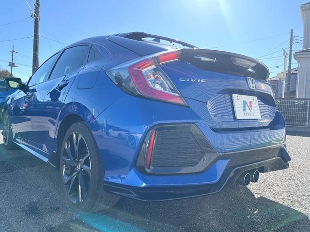 シビック ハッチバック　ホンダセンシング　６速ＭＴ　純正ナビ　ＥＴＣ　ドライブレコーダー　ＬＥＤヘッドライト　純正１８インチアルミホイール　シートヒーター　スマートキー　アイドリングストップ　オートライト　オートエアコン　革巻きステアリング（49枚目）