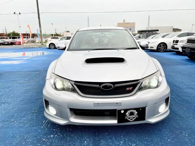 インプレッサ ＷＲＸ　ＳＴＩ　Ａライン　Ｂｌｕｅｔｏｏｔｈオーディオ／地デジＨＤＤナビ／クルコン／ＨＩＤ／フォグ／パドルシフト／ＥＴＣ／Ｂカメラ／ミラーウインカー／社外マフラー／純正ＡＷ／革シート（2枚目）