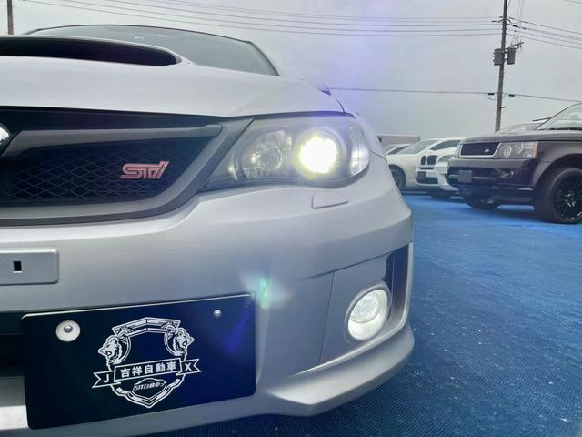 インプレッサ ＷＲＸ　ＳＴＩ　Ａライン　Ｂｌｕｅｔｏｏｔｈオーディオ／地デジＨＤＤナビ／クルコン／ＨＩＤ／フォグ／パドルシフト／ＥＴＣ／Ｂカメラ／ミラーウインカー／社外マフラー／純正ＡＷ／革シート（4枚目）