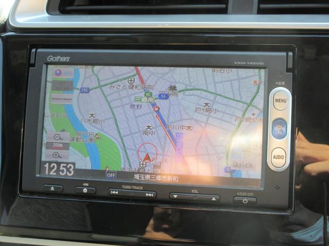 フィット 13G・Lパッケージ 当店ユーザー様直接買取車 禁煙 純正ナビ 地デジTV バックカメラ ETC Bluetoothオーディオ スマートキー プッシュスタート LEDライト フォグランプ あんしんパッケージ(7枚目)