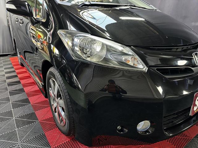 フリード Ｇ　ジャストセレクション　１年間走行距離無制限保証　両側電動パワースライドドア　モデューロエアロ　ナビ　ＤＶＤ　フルセグＴＶ　Ｂｌｕｅｔｏｏｔｈ　前後ドラレコ　バックカメラ　新品フロアマット　消耗品交換　予防整備実施車（8枚目）