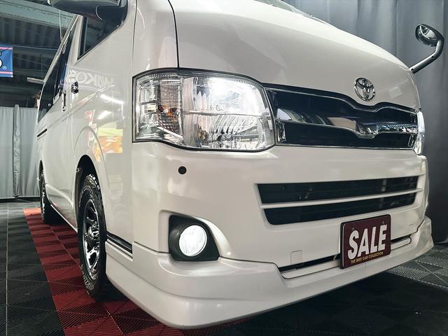 ハイエースバン ロングスーパーGL ディーゼルターボ パールホワイト 両側スライド スマホ連動ディスプレー 純正バックカメラ フルセグTV Bluetooth オートエアコン 社外アルミ タイベル交換済 バッテリー交換済 シートカバー(10枚目)