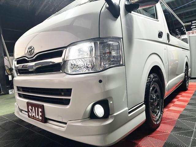 ハイエースバン ロングスーパーGL ディーゼルターボ パールホワイト 両側スライド スマホ連動ディスプレー 純正バックカメラ フルセグTV Bluetooth オートエアコン 社外アルミ タイベル交換済 バッテリー交換済 シートカバー(19枚目)