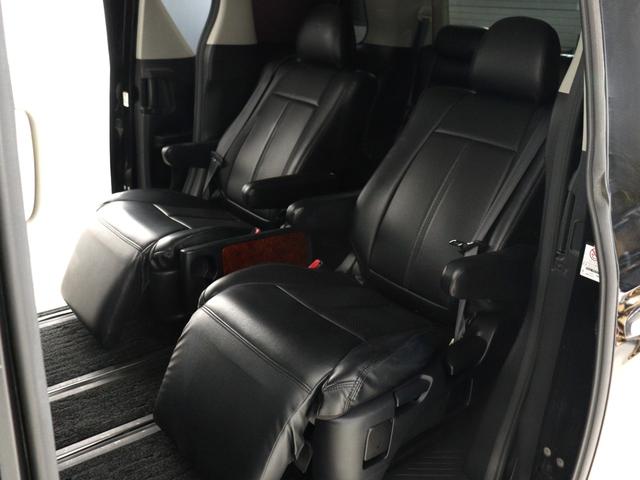 ヴェルファイア ２．４Ｚ　プラチナムセレクション　（禁煙車）（特別仕様車）（後席モニター）（純正ナビ）（黒革調シートカバー装着）パワーバックドア　両側電動スライドドア　ＥＴＣ　カラーバックモニター　ウッドコンビハンドル　クリアランスソナー　オットマン（2枚目）
