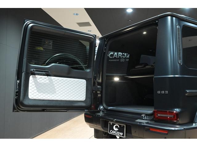 Ｇクラス Ｇ６３　法人１オーナー／ナイトブラックマグノ／ＭＡＮＵＦＡＫＴＵＲプログラムプラス／白黒レザー／ＡＭＧナイトパッケージ／ＭＡＮＵＦＡＫＴＵＲインテリアプラス／ＡＭＧ２２インチ／Ｂｕｒｍｅｓｔｅｒ３Ｄサラウンド（56枚目）
