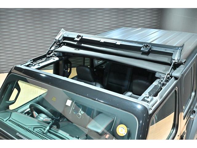 ジープ・ラングラーアンリミテッド ルビコン　１オナ／サンライダー／ＪＥＰＰＥＳＥＮアップコイル／ＧＥＯＲＡＮＤＡＲ　ＭＴ　Ｇ００３　３５×１２．５Ｒ１７／黒革／シートヒーター／ステアリングヒーター／純正ナビ／フルセグ／カープレイ／ＡＣＣ／ＢＳＭ（3枚目）