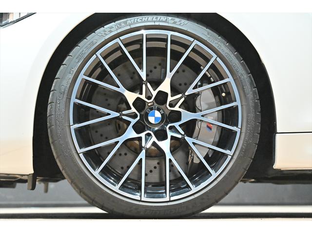 M2 コンペティション ワンオーナー/ハーマンカードン/純正Mパフォーマンスカーボンエアロ/アルピンホワイト/純正19インチAW/アダプティブLEDヘッドライト/Mスポーツブレーキ/シートヒーター/クルコン/バックカメラ(16枚目)