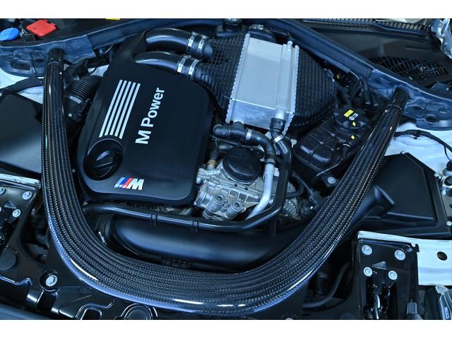 M2 コンペティション ワンオーナー/ハーマンカードン/純正Mパフォーマンスカーボンエアロ/アルピンホワイト/純正19インチAW/アダプティブLEDヘッドライト/Mスポーツブレーキ/シートヒーター/クルコン/バックカメラ(59枚目)