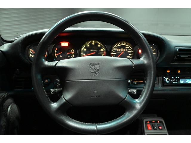 911 911ターボ 430馬力/SR/黒革/パワーシート/リアフェンダーダクト付き/大型ターボウイング/リアワイパー/レッドキャリパー/ハイパフォーマンスブレーキ/強化サスペンション/18インチ中空AW/純正マフラー(35枚目)