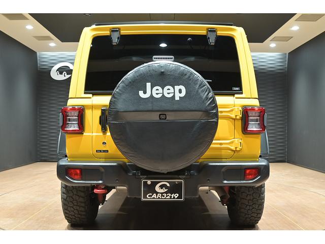 ジープ・ラングラーアンリミテッド ルビコン スカイワンタッチパワートップ 49台限定車/ヘラヤライエロー/純正電動ソフトトップ/ボンネットシールド/専用19インチAW/専用ロゴステッカー/専用デフロック機構/シートヒーター/ステアリングヒーター/BFグドリッヂMTタイヤ(7枚目)