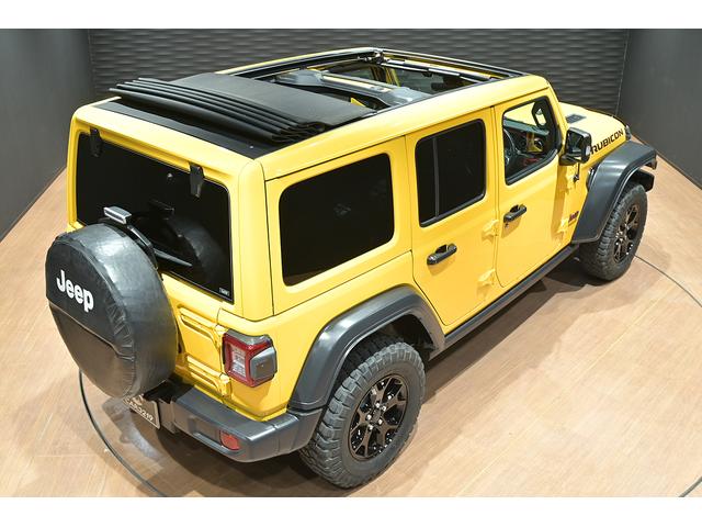 ジープ・ラングラーアンリミテッド ルビコン スカイワンタッチパワートップ 49台限定車/ヘラヤライエロー/純正電動ソフトトップ/ボンネットシールド/専用19インチAW/専用ロゴステッカー/専用デフロック機構/シートヒーター/ステアリングヒーター/BFグドリッヂMTタイヤ(9枚目)