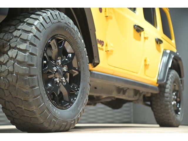 ジープ・ラングラーアンリミテッド ルビコン スカイワンタッチパワートップ 49台限定車/ヘラヤライエロー/純正電動ソフトトップ/ボンネットシールド/専用19インチAW/専用ロゴステッカー/専用デフロック機構/シートヒーター/ステアリングヒーター/BFグドリッヂMTタイヤ(18枚目)