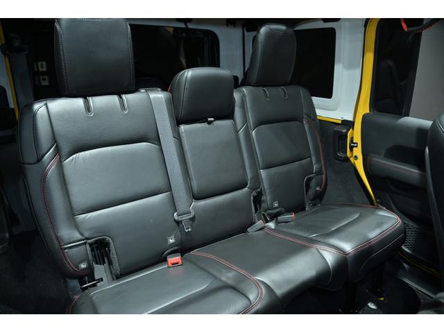 ジープ・ラングラーアンリミテッド ルビコン スカイワンタッチパワートップ 49台限定車/ヘラヤライエロー/純正電動ソフトトップ/ボンネットシールド/専用19インチAW/専用ロゴステッカー/専用デフロック機構/シートヒーター/ステアリングヒーター/BFグドリッヂMTタイヤ(21枚目)