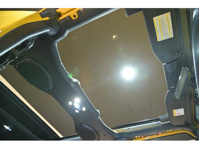 ジープ・ラングラーアンリミテッド ルビコン スカイワンタッチパワートップ 49台限定車/ヘラヤライエロー/純正電動ソフトトップ/ボンネットシールド/専用19インチAW/専用ロゴステッカー/専用デフロック機構/シートヒーター/ステアリングヒーター/BFグドリッヂMTタイヤ(34枚目)