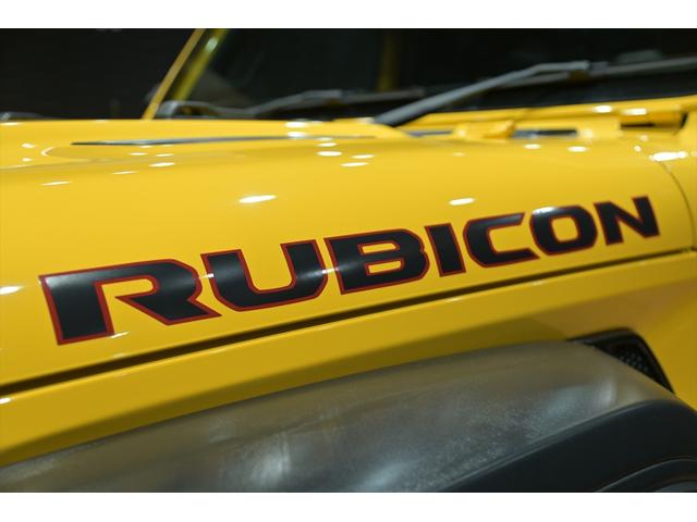 ジープ・ラングラーアンリミテッド ルビコン スカイワンタッチパワートップ 49台限定車/ヘラヤライエロー/純正電動ソフトトップ/ボンネットシールド/専用19インチAW/専用ロゴステッカー/専用デフロック機構/シートヒーター/ステアリングヒーター/BFグドリッヂMTタイヤ(35枚目)