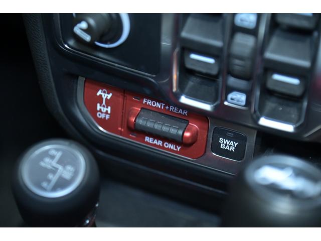 ジープ・ラングラーアンリミテッド ルビコン スカイワンタッチパワートップ 49台限定車/ヘラヤライエロー/純正電動ソフトトップ/ボンネットシールド/専用19インチAW/専用ロゴステッカー/専用デフロック機構/シートヒーター/ステアリングヒーター/BFグドリッヂMTタイヤ(52枚目)